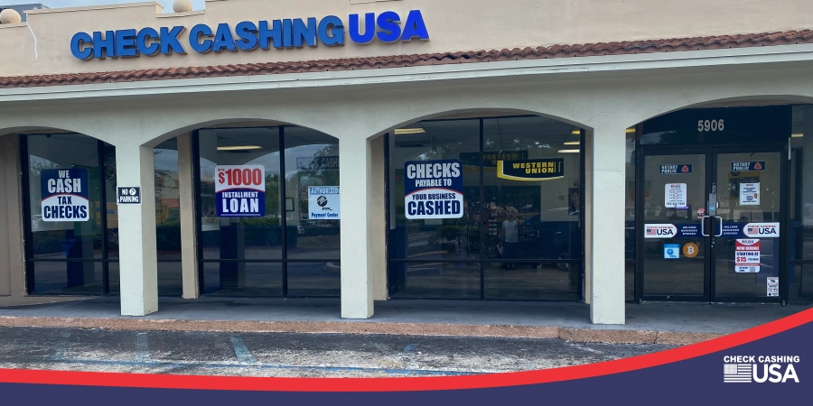 A blue Check Cashing USA sign is above our location on Pembroke Road in West Park, FL